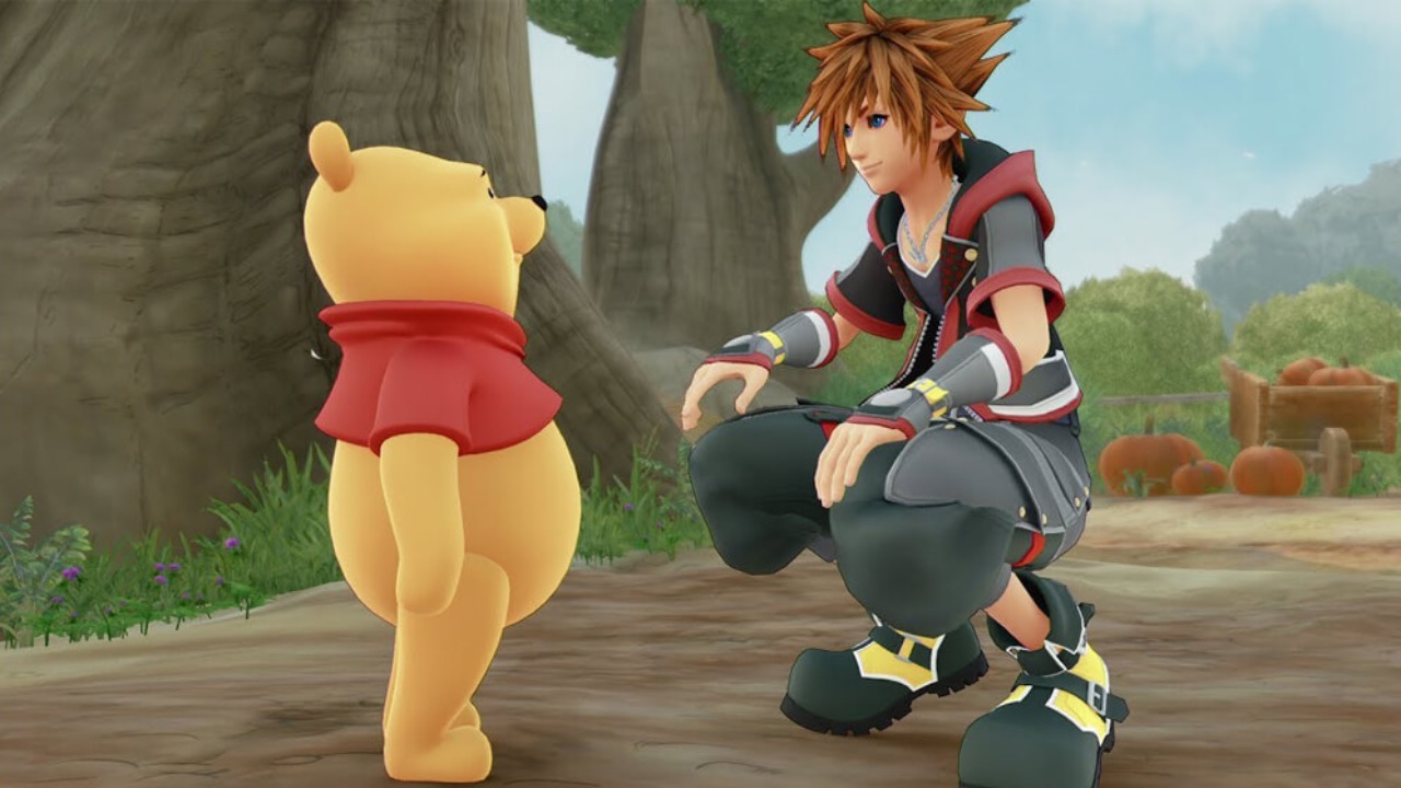 The featured image for our Kingdom Hearts Missing Link tier list, featuring a character from the Square Enix brand talking to the Pooh bear.