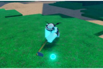 the image shows my avatar slamming the grassy ground with a farm tool whilst a blue orb lights the scenery around her