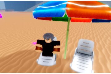 the image shows my avatar with messy grey hair and a big grin sat on a sun lounger on a sandy beach. They are sat beneath a multicoloured umbrella and have their sword adorned to their side
