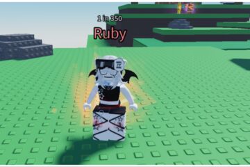 the image shows my avatar stood on a lego-like grassy brick flat land with the rage aura equipped which emits a red particle effect from my avatar